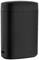 Appareil noir, cylindrique, aux bords arrondis, probablement un produit électronique avec un port USB sur le côté.