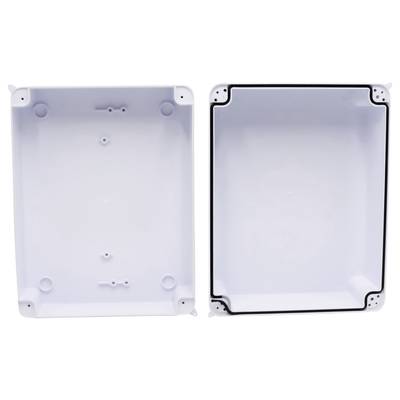 Deux boîtiers rectangulaires blancs en plastique, l'un avec un joint d'étanchéité noir sur les bords ; les deux montrant leur face intérieure.