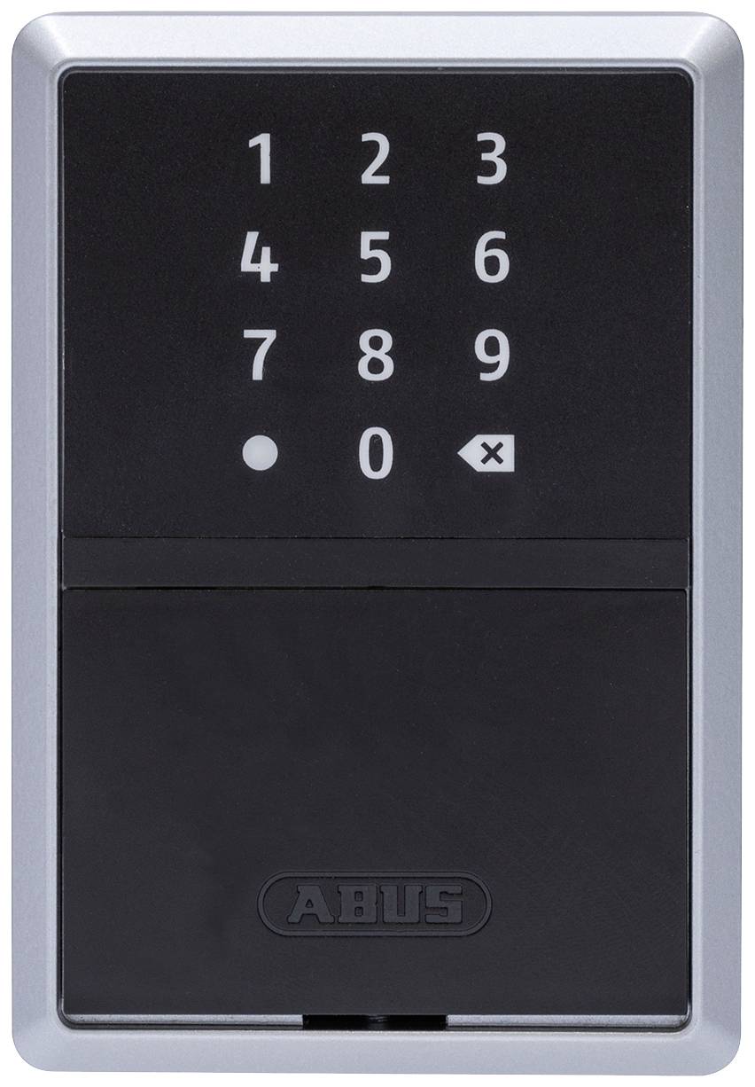 Cadenas 'ABUS' avec clavier numérique digital. La moitié supérieure affiche des chiffres et des touches, la moitié inférieure dispose d'un couvercle.