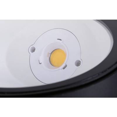 Gros plan d'un voyant LED rond blanc installé dans un boîtier noir, intégré dans un appareil ou une lampe.