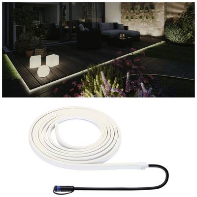 Un jardin éclairé avec une décoration d'ambiance et des plantes. En bas de l'image, une barre lumineuse LED blanche avec son câble de connexion.