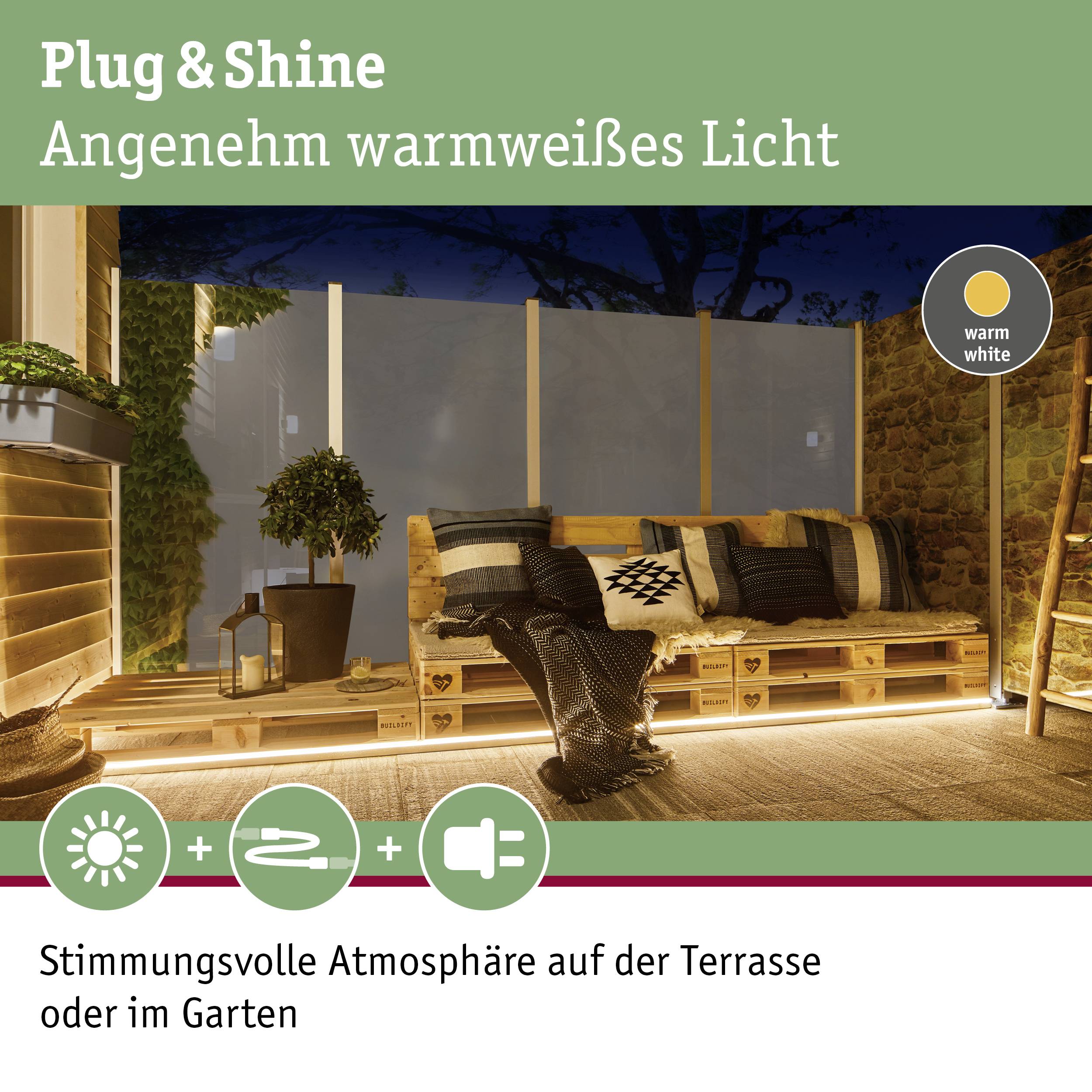 Plug & Shine Éclairage de jardin : Banc en bois et coussin sur la terrasse, une lumière blanc chaud crée une ambiance chaleureuse dans le jardin.