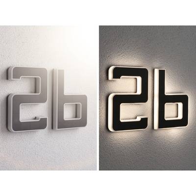 '2b' installé en chiffres modernes sur un mur. À gauche : argent réfléchissant, à droite : noir avec rétroéclairage.