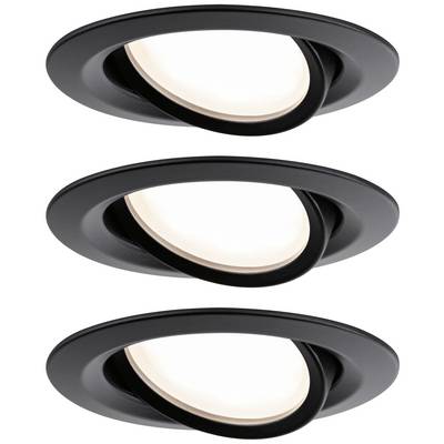 Trois spots encastrables noirs mobiles, orientables dans différents angles, éclairent la pièce. Ils sont modernes et adaptés à un éclairage flexible.