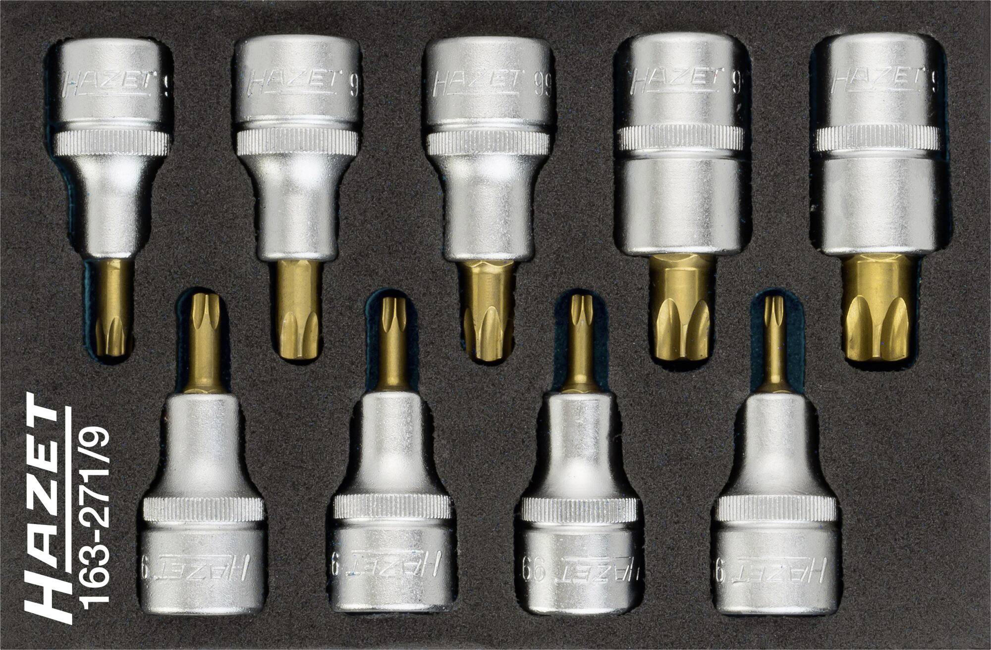 Un ensemble de neuf embouts Torx de la marque Hazet pour tournevis, disposés sur un fond noir.
