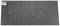 Tapis noir et blanc à pois avec une étiquette dans le coin supérieur gauche ; forme rectangulaire.