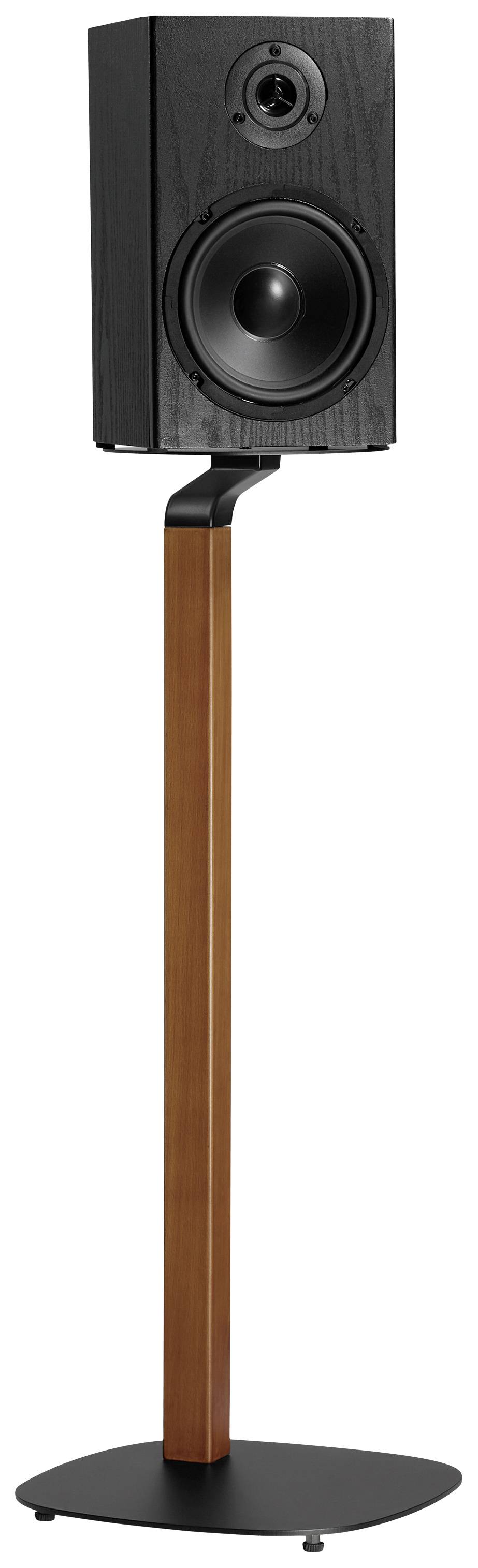 Un haut-parleur noir est posé sur un support étroit en bois, reposant sur une base stable de couleur noire.