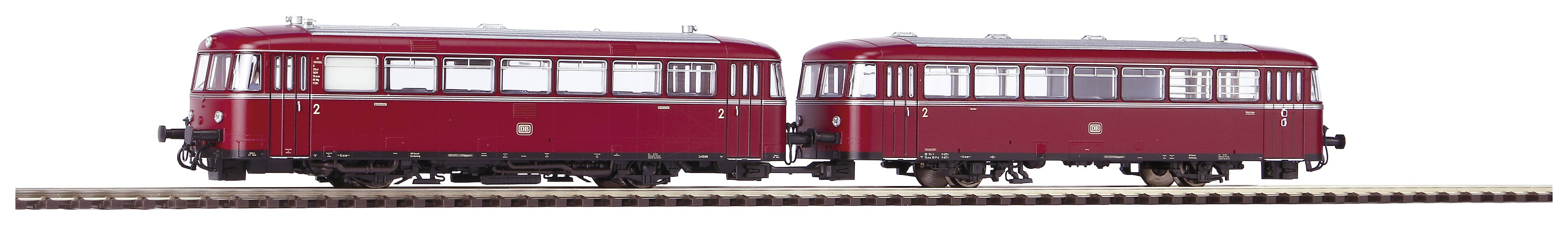Un autorail rouge à deux essieux sur des rails. Il dispose de plusieurs fenêtres et est adapté aux transports locaux.