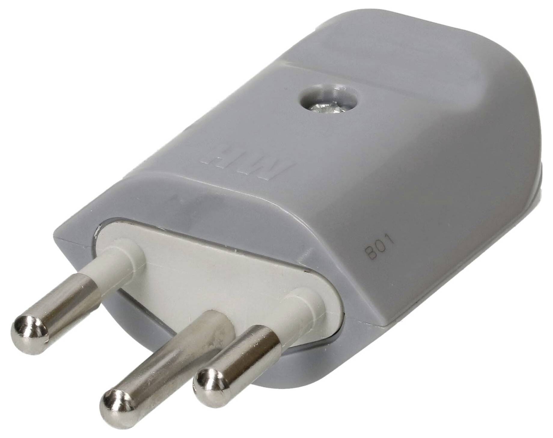 Un gros plan sur un adaptateur électrique gris avec trois broches rondes, utilisé pour brancher des appareils électroniques sur des prises de courant dans des régions spécifiques.