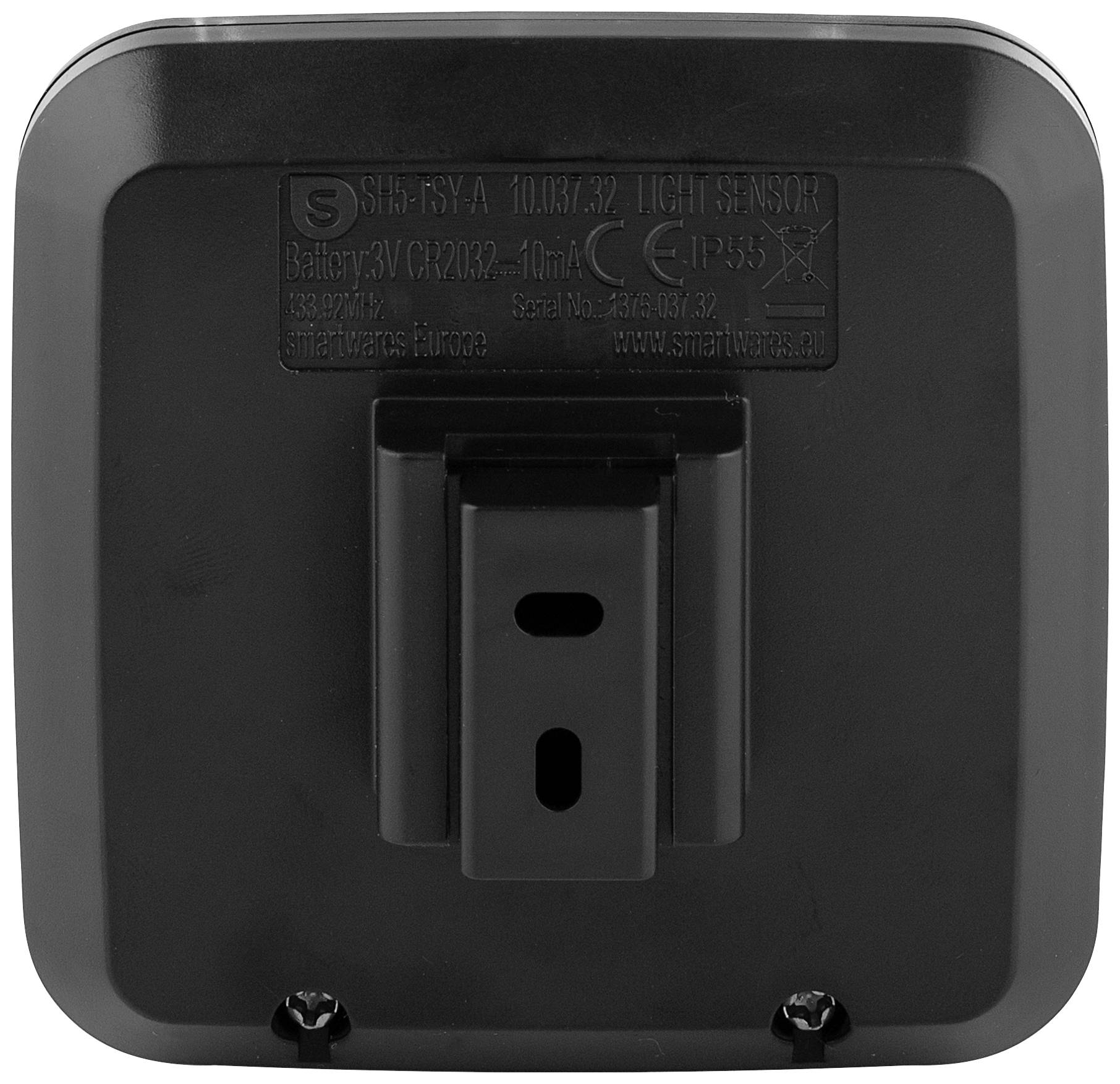 Dos d'un appareil noir avec compartiment à pile et support de suspension. Texte : SH5-RS-A, Type de pile 3V CR2032, Capteur de lumière.