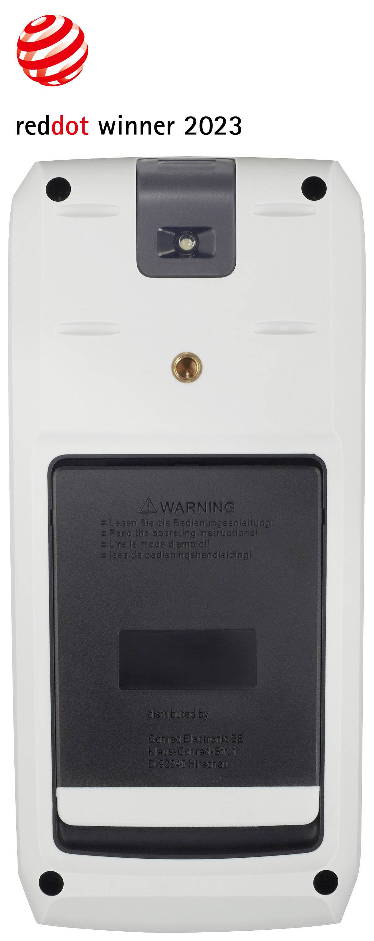 Un appareil électronique avec une étiquette de prix 'reddot winner 2023' en haut. Le dos montre un compartiment de batterie et un avertissement.