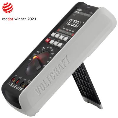 Un multimètre numérique sur support, gagnant du Red Dot Award 2023, affichant la marque Voltcraft et un écran avec un sélecteur rotatif.