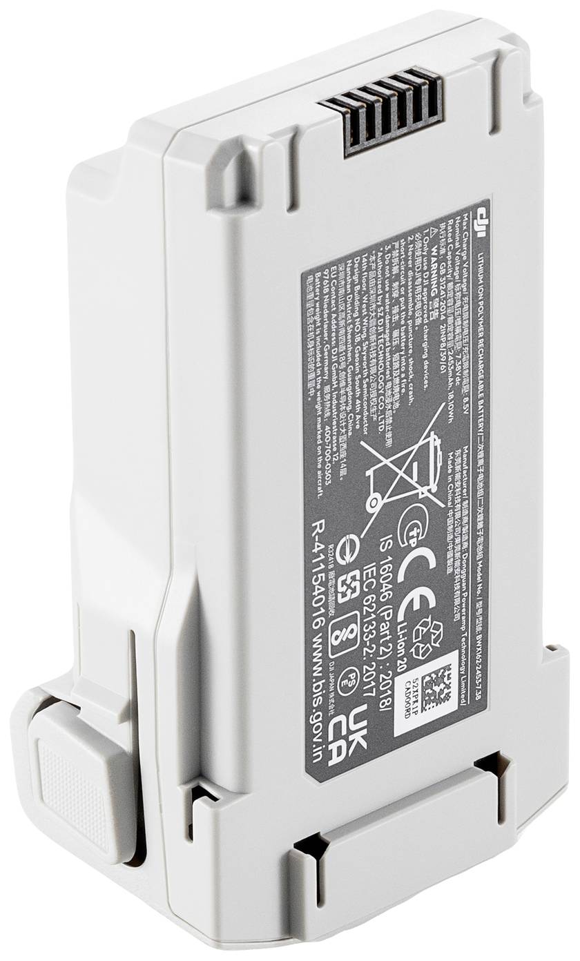 Un pack de batterie blanc rectangulaire avec des instructions de sécurité et de recyclage sur la face avant, ainsi que les marquages CE et UKCA.