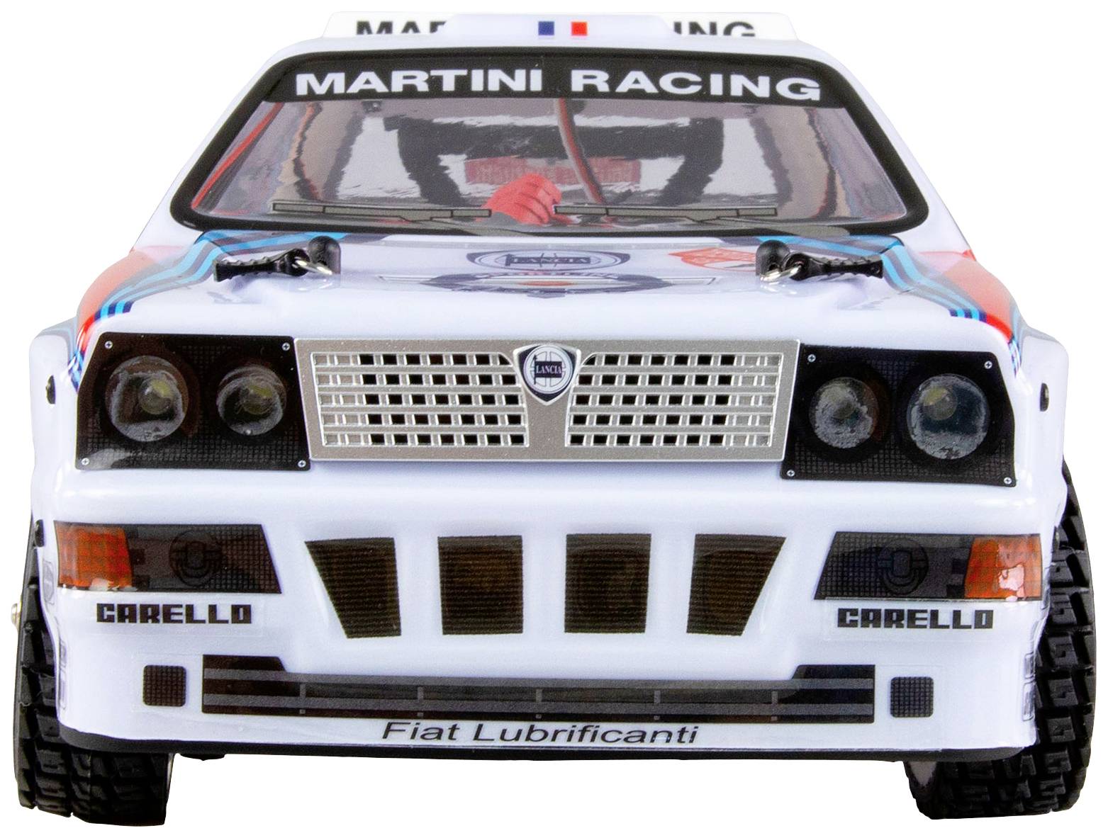 Une voiture de rallye portant l'inscription 'Martini Racing' sur le capot. Elle arbore les logos 'Fiat Lubrificanti' et 'Carello' sur le pare-chocs.