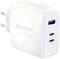 Un chargeur blanc avec trois ports : un USB-A et deux USB-C. La mention 'VOLTCRAFT UC-3ACX002' est visible.