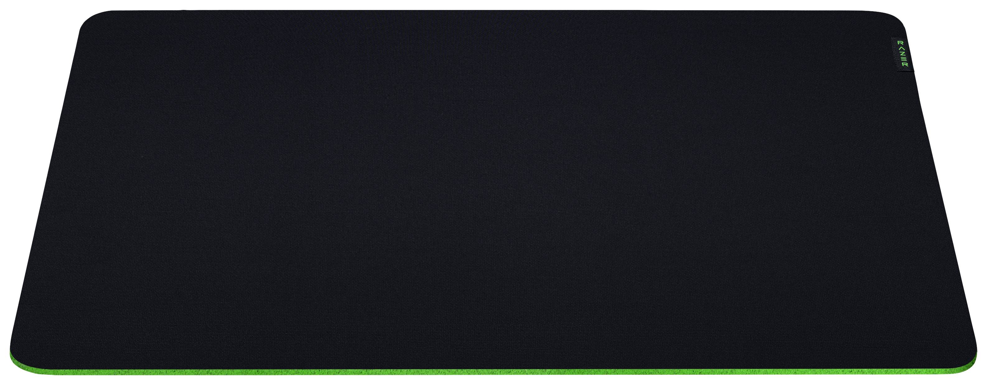Un tapis de souris rectangulaire noir avec un contour vert légèrement luminescent.