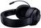 Un casque gaming filaire noir avec des coussinets d'oreilles rembourrés et un bras de microphone flexible, vu de côté.