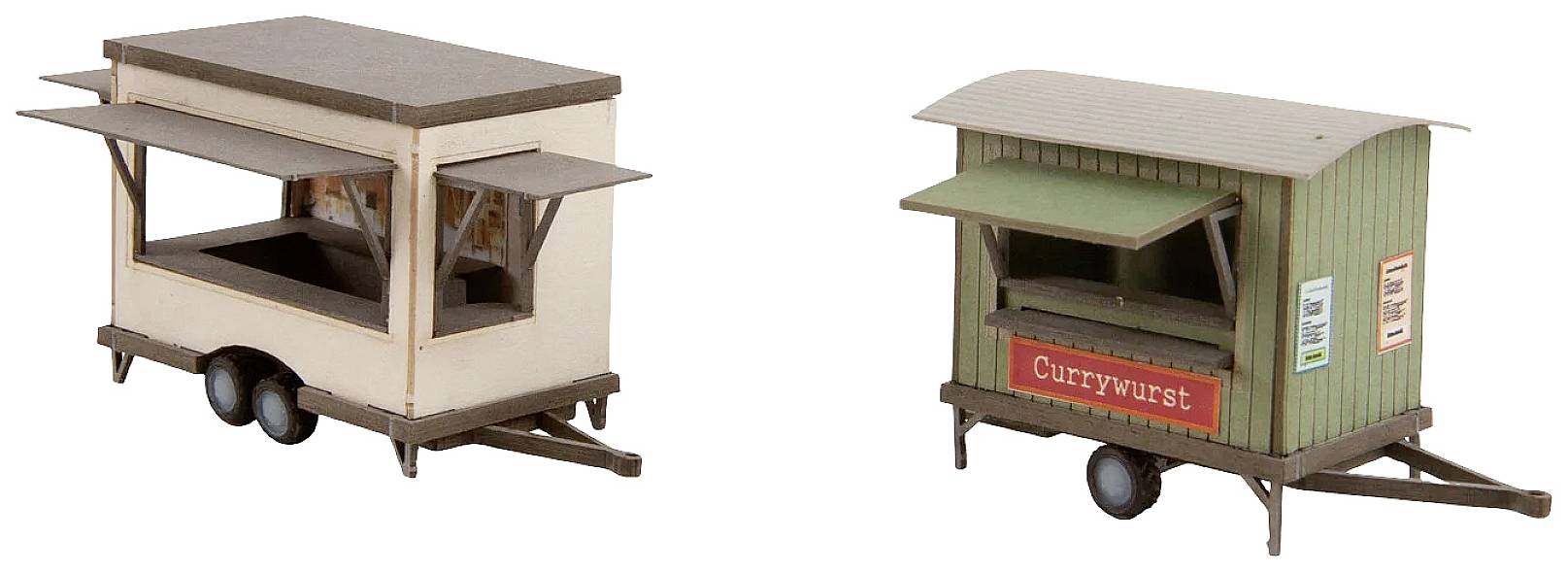 Deux stands de restauration modèles : à gauche, une remorque beige avec des fenêtres de vente ouvertes, à droite, un stand vert portant l'inscription « Currywurst ».