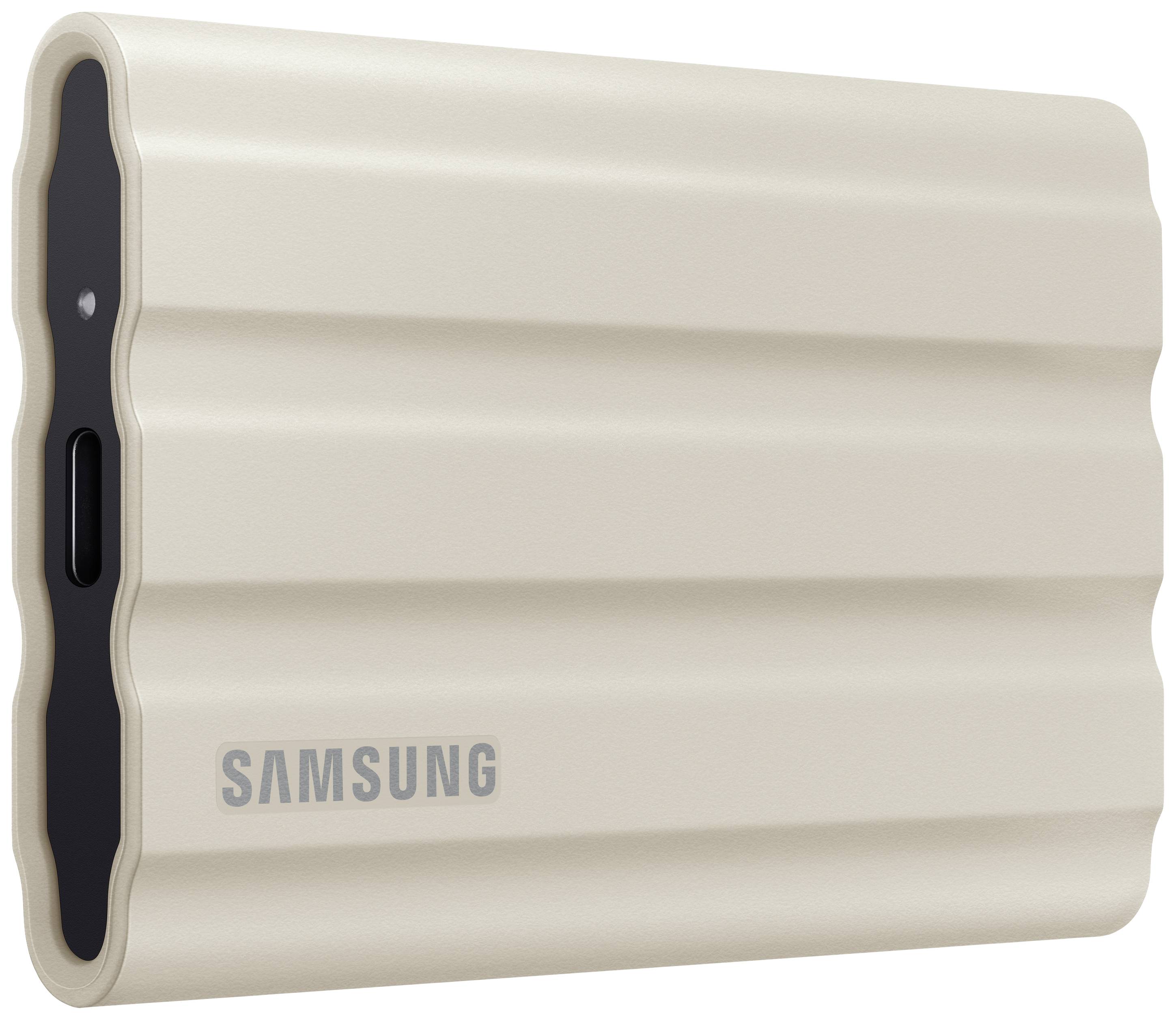 SSD externe Samsung beige avec boîtier texturé, pour le stockage portable de données.
