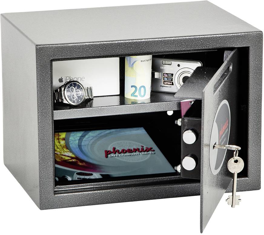 Un coffre-fort ouvert montre un billet de banque, un téléphone portable, un appareil photo et une montre dans le compartiment supérieur, ainsi que des documents dans le compartiment inférieur.