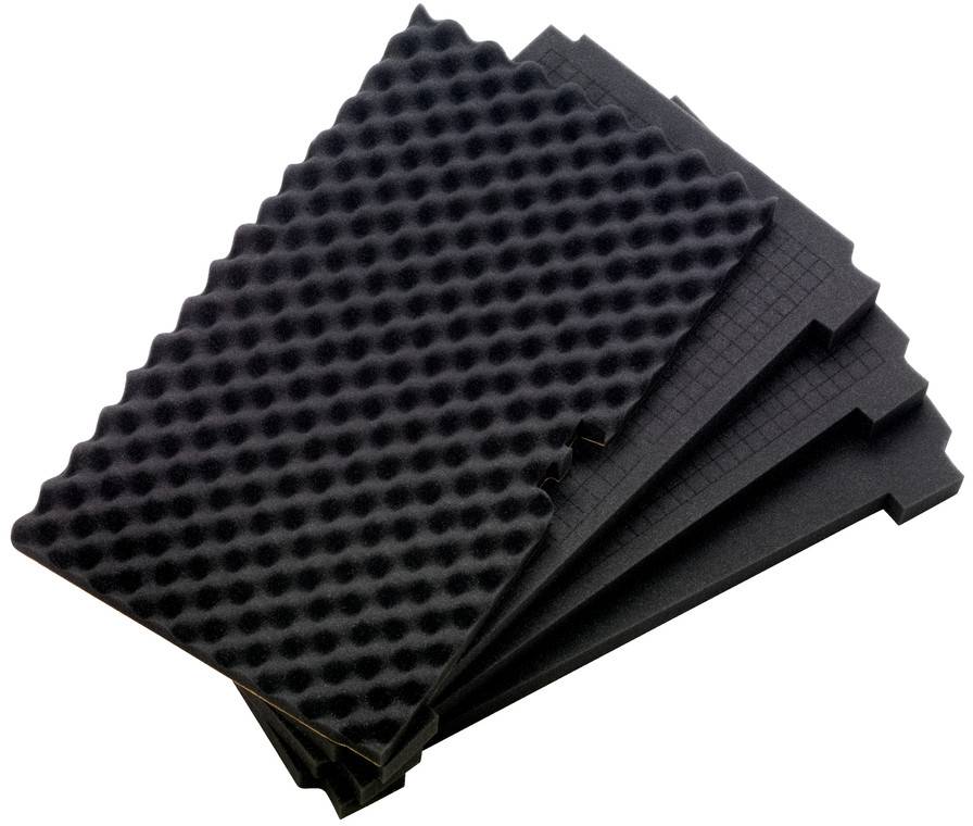 Pile de panneaux de mousse acoustique noire avec textures en coin et en alvéoles, utilisés pour l'insonorisation ou l'absorption du bruit.