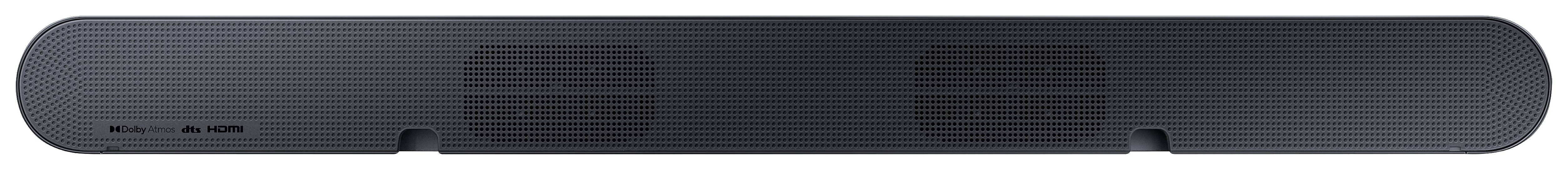 Soundbar noire, rectangulaire, aux angles arrondis, avec deux grilles de haut-parleurs visibles, posée sur une surface.