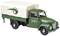 Camion vert ancien avec une bâche claire et l'inscription "WZ Kraftfahrzeugwerke". Design rétro, style de voiture miniature.