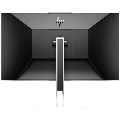 Un moniteur d'ordinateur vu de dos, noir avec un support argenté. Le boîtier de l'écran présente un design épuré.
