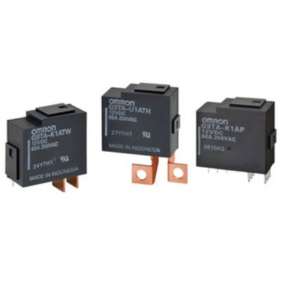 Trois relais noirs d'Omron avec les modèles G9TA-K1ATW, G9TA-U1ATH et G9TA-K1AP. Étiquetés 'MADE IN INDONESIA'.