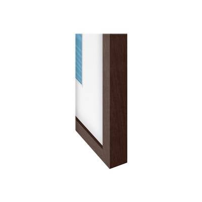 Cadre en bois avec un étroit fragment d'image bleu clair, vu de côté.
