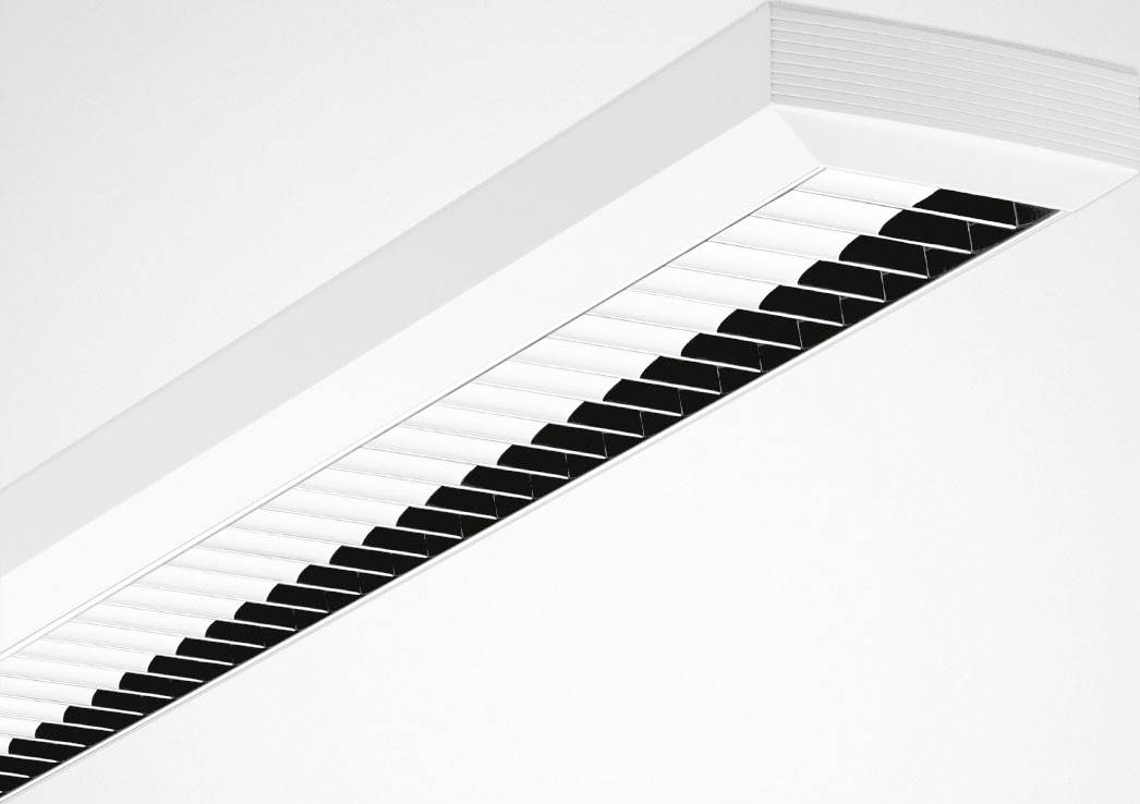 Un luminaire de plafond moderne au design rectangulaire, composé de rayures blanches et noires, installé sur un plafond blanc.