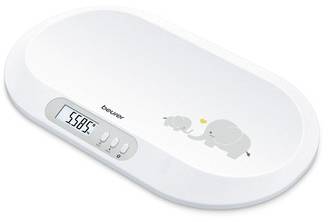 Une balance pour bébé blanche avec affichage numérique indique '5685'. Des éléphants gris sont illustrés sur la balance.