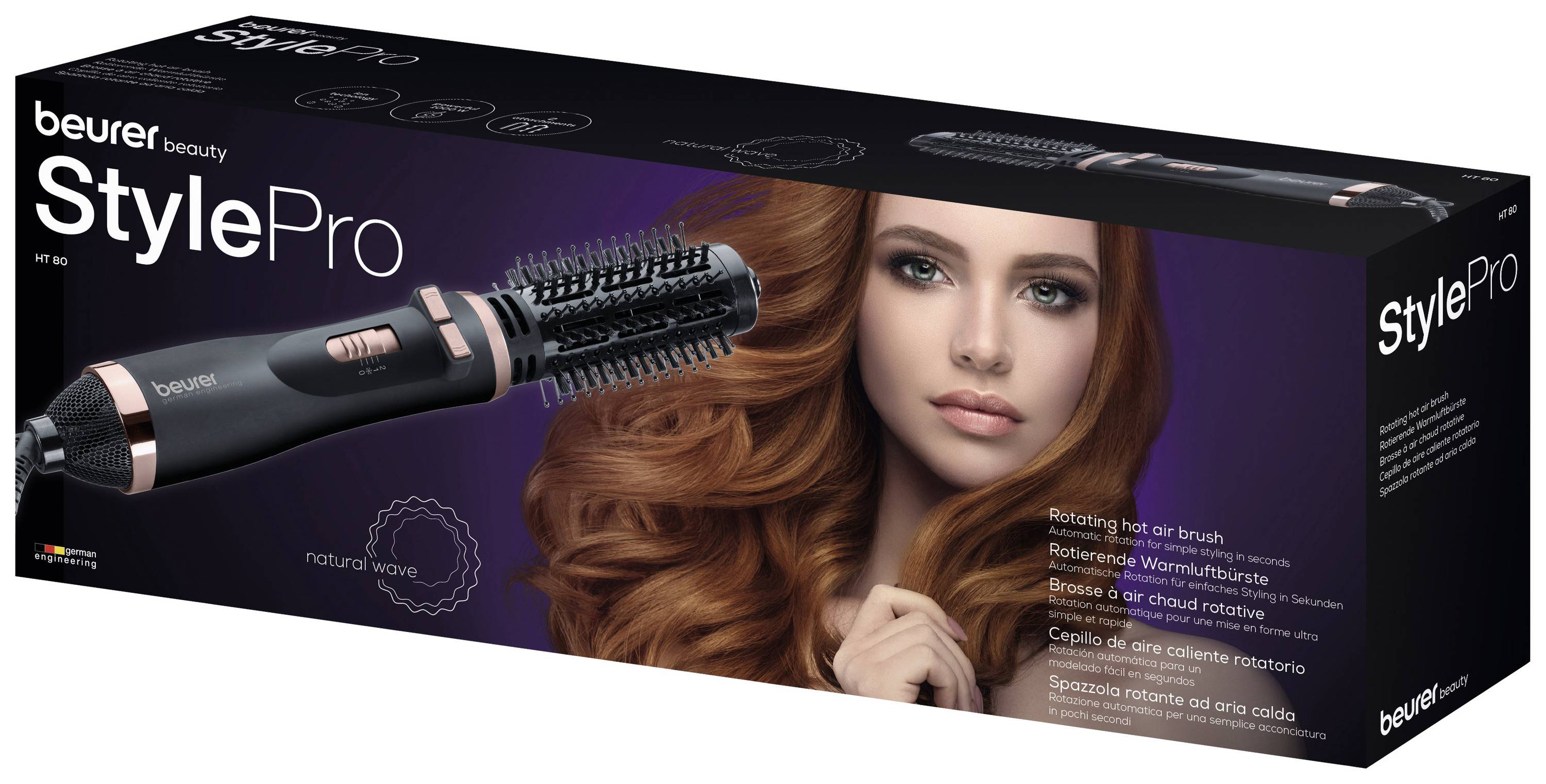 Emballage d'un ensemble de brosse à air chaud rotative StylePro avec une image d'une femme aux cheveux longs et ondulés ; marque 'beurer'.