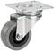 Roulette de transport grise, pivotante, avec support en métal, adaptée aux meubles ou aux appareils de transport.