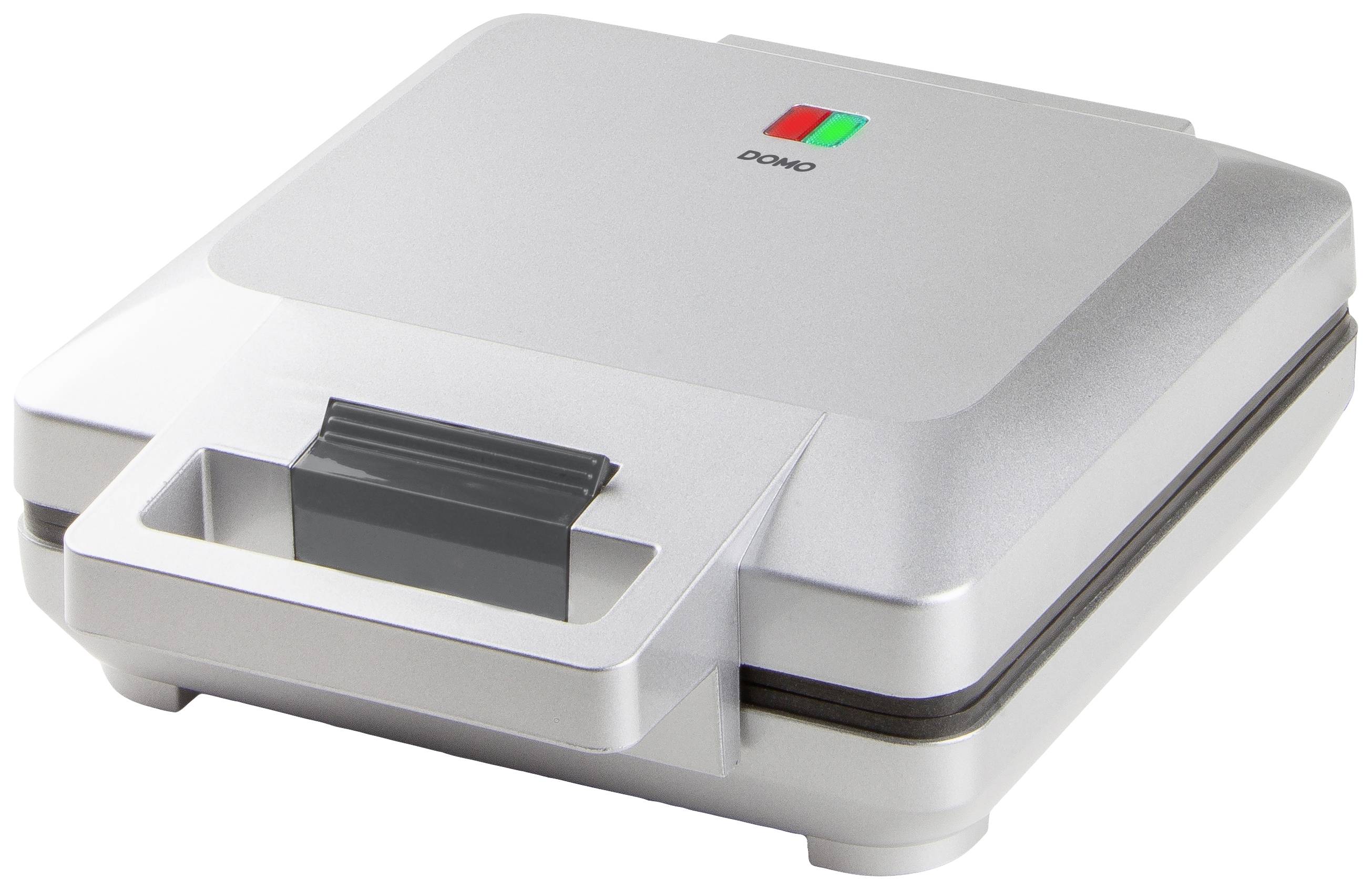 Un gaufrier en argent avec couvercle fermé et affichage de température.