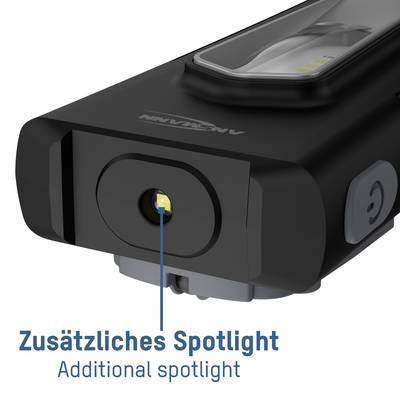 Une lampe de poche noire avec un projecteur jaune supplémentaire sur sa face inférieure. Annoté : 'Projecteur supplémentaire'.