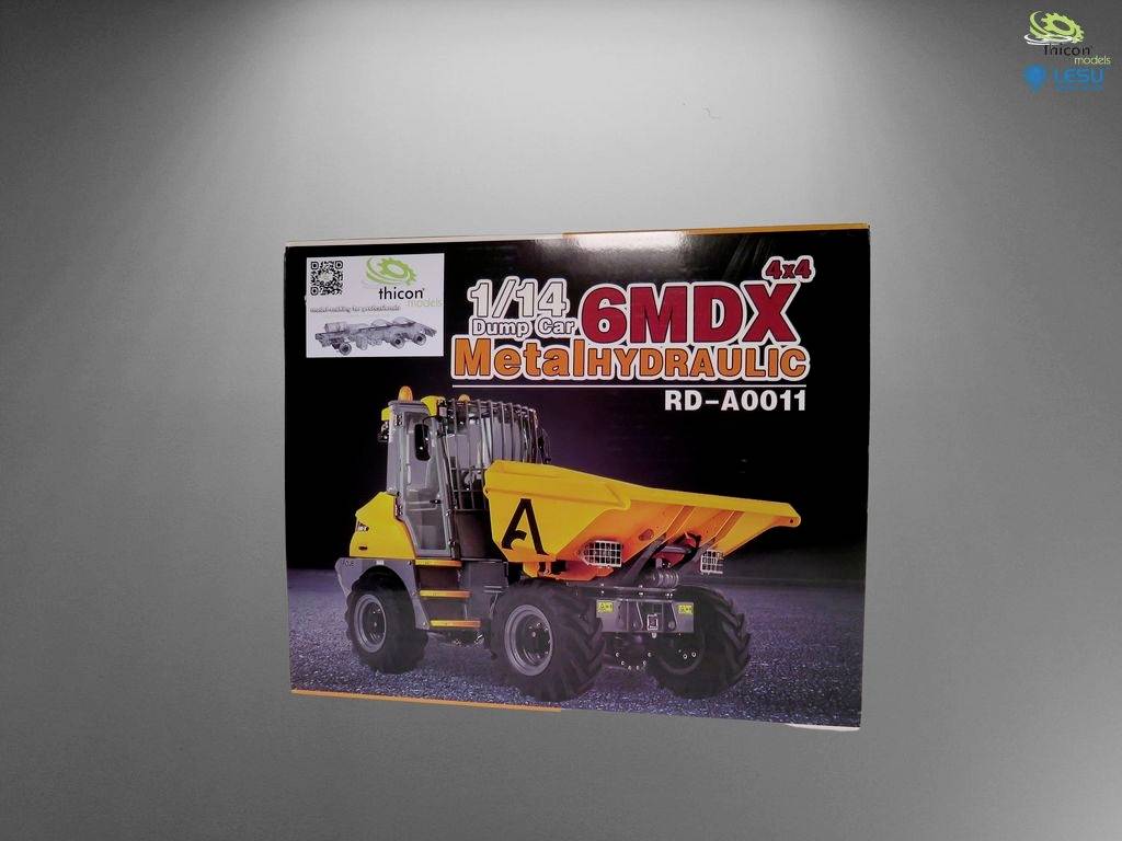 Emballage de produit pour un modèle de camion-benne hydraulique en métal 1/14, de couleur jaune, avec l'inscription « 6MDX ». Image d'un camion-benne jaune.