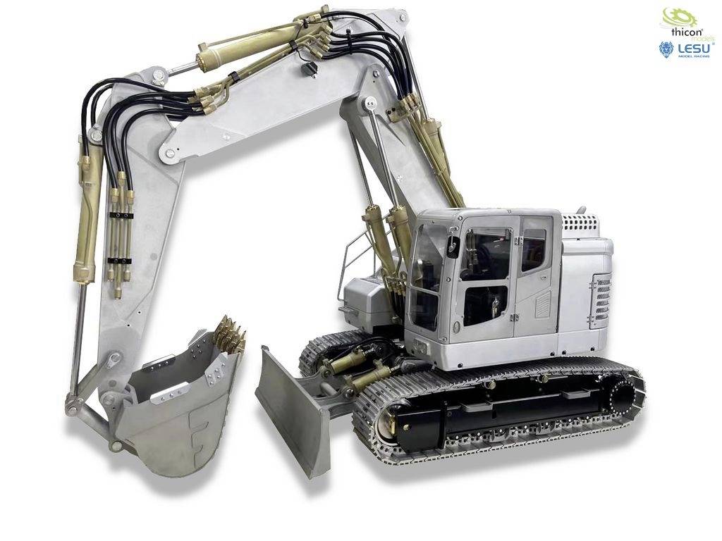 Un bulldozer hydraulique argenté à chenilles avec un godet. Il est conçu avec un grand souci du détail et se trouve sur une surface blanche.