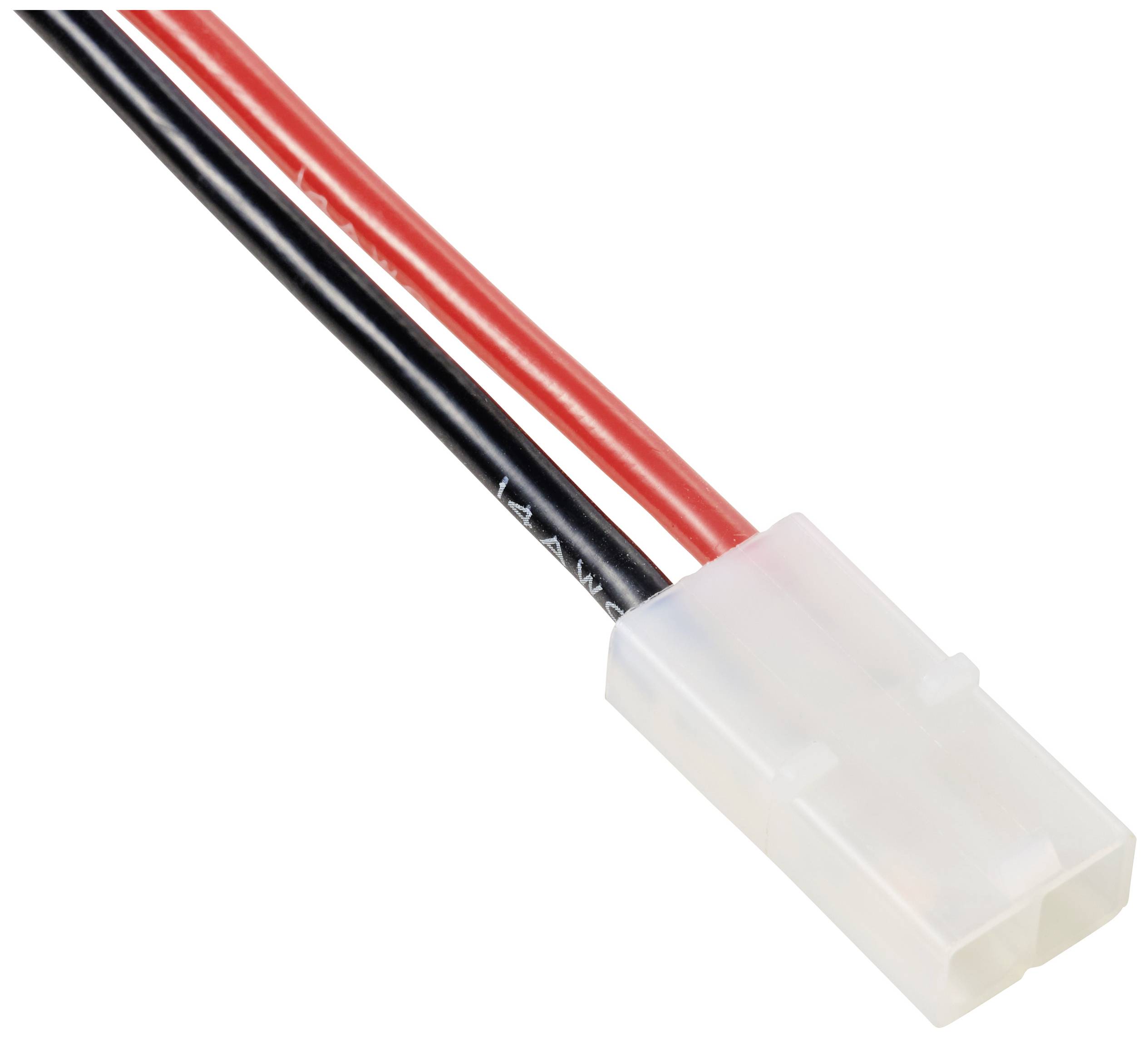 Câble électrique à deux conducteurs avec fil rouge et noir, connecté à une fiche en plastique blanc, gros plan.