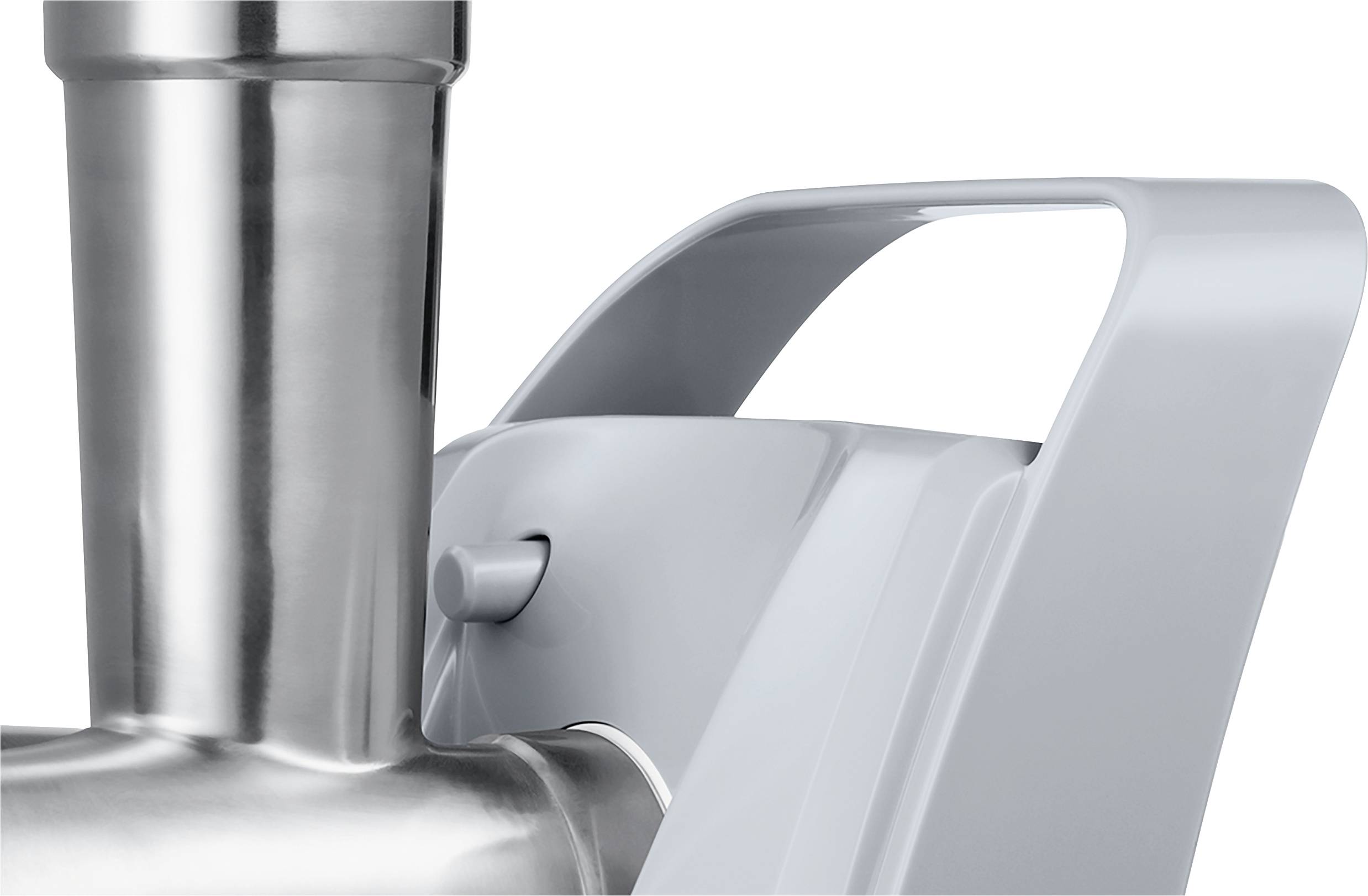 Partie d'un appareil de cuisine moderne argenté avec des bords lisses et arrondis. Les matériaux principaux sont l'acier inoxydable et le plastique.