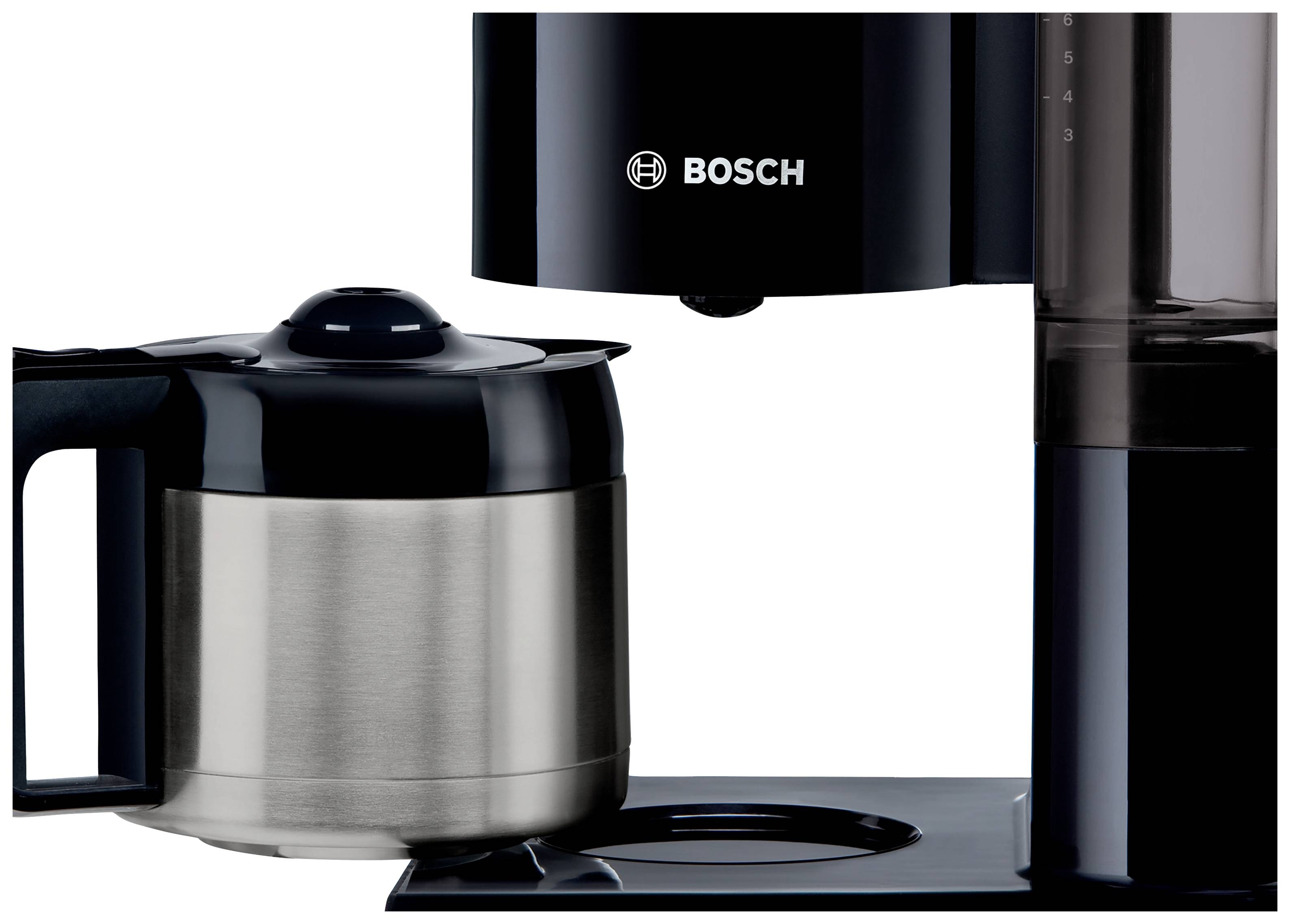 Une machine à café Bosch en noir avec un thermos en acier inoxydable.