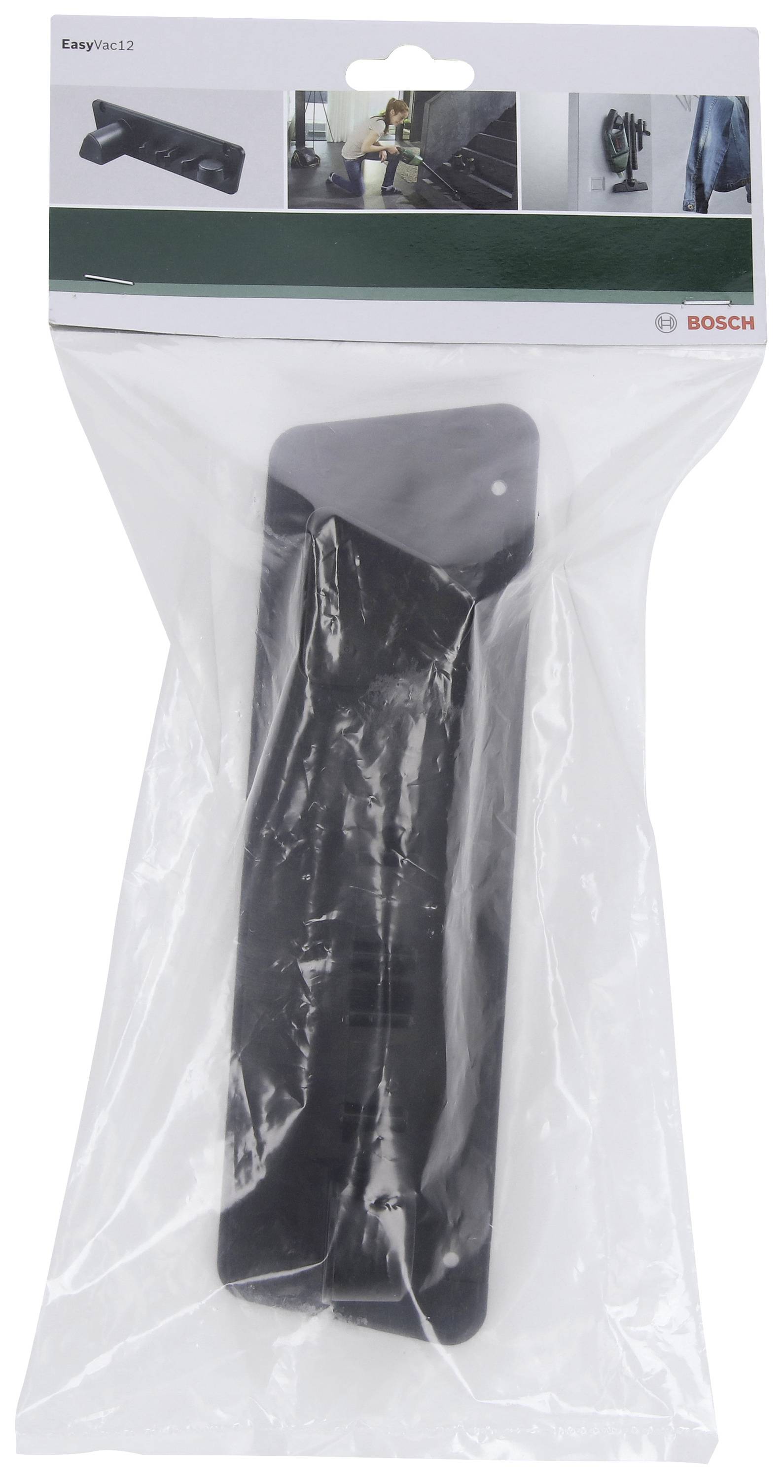 Un emballage en plastique contenant un support d'outils noir de Bosch. L'emballage présente des images illustrant l'utilisation du produit.