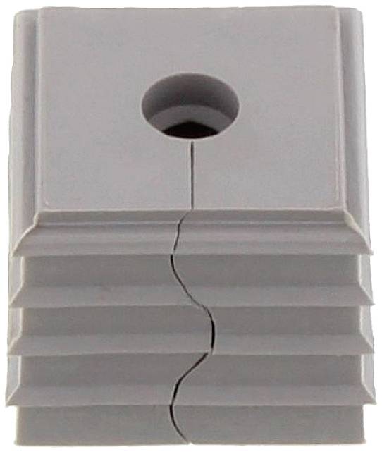 Pièce en plastique grise avec quatre rainures horizontales et un trou rond centré en haut, fendue par une fissure droite.