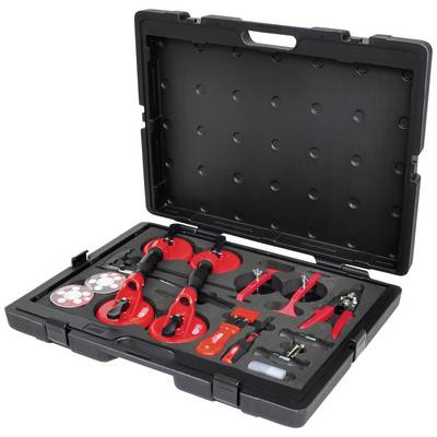 Une mallette à outils noire, dont le couvercle est ouvert, présente divers outils et accessoires rouges, soigneusement rangés dans des compartiments.