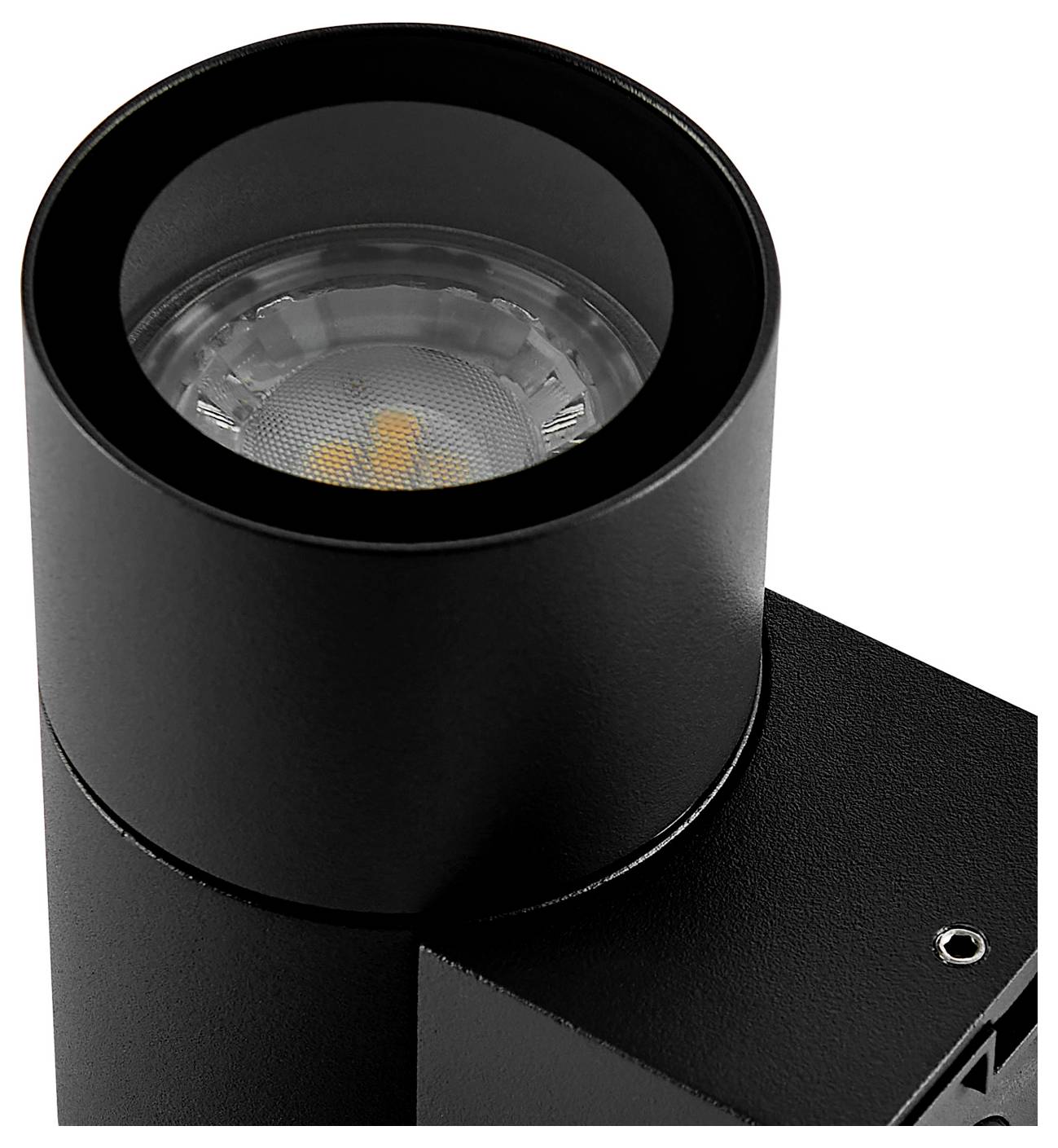 Spot LED cylindrique noir monté sur une base carrée, présenté en gros plan sur fond blanc.