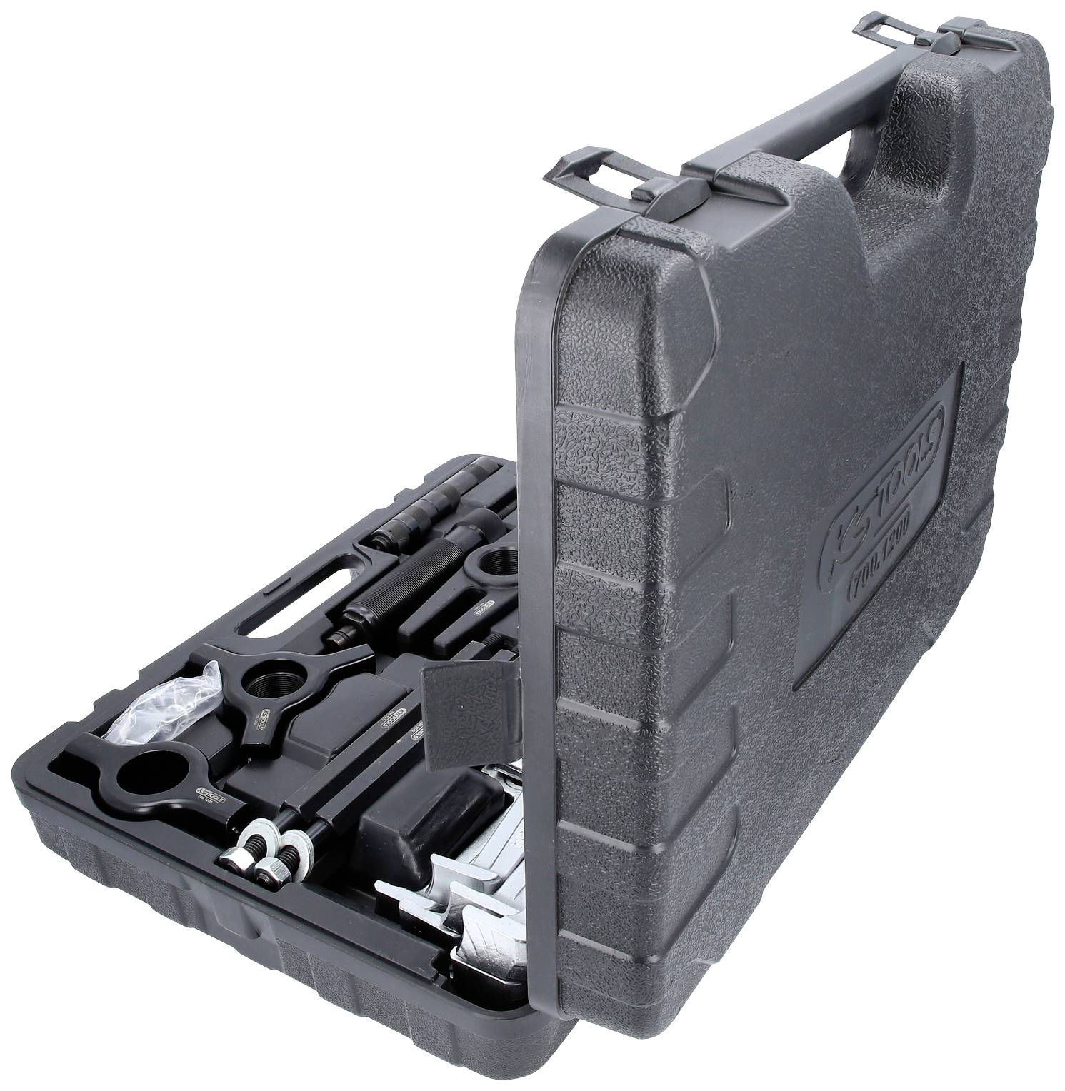 Un coffret à outils noir avec des compartiments spécifiques pour les réparations automobiles. Le coffret est ouvert et montre divers outils.