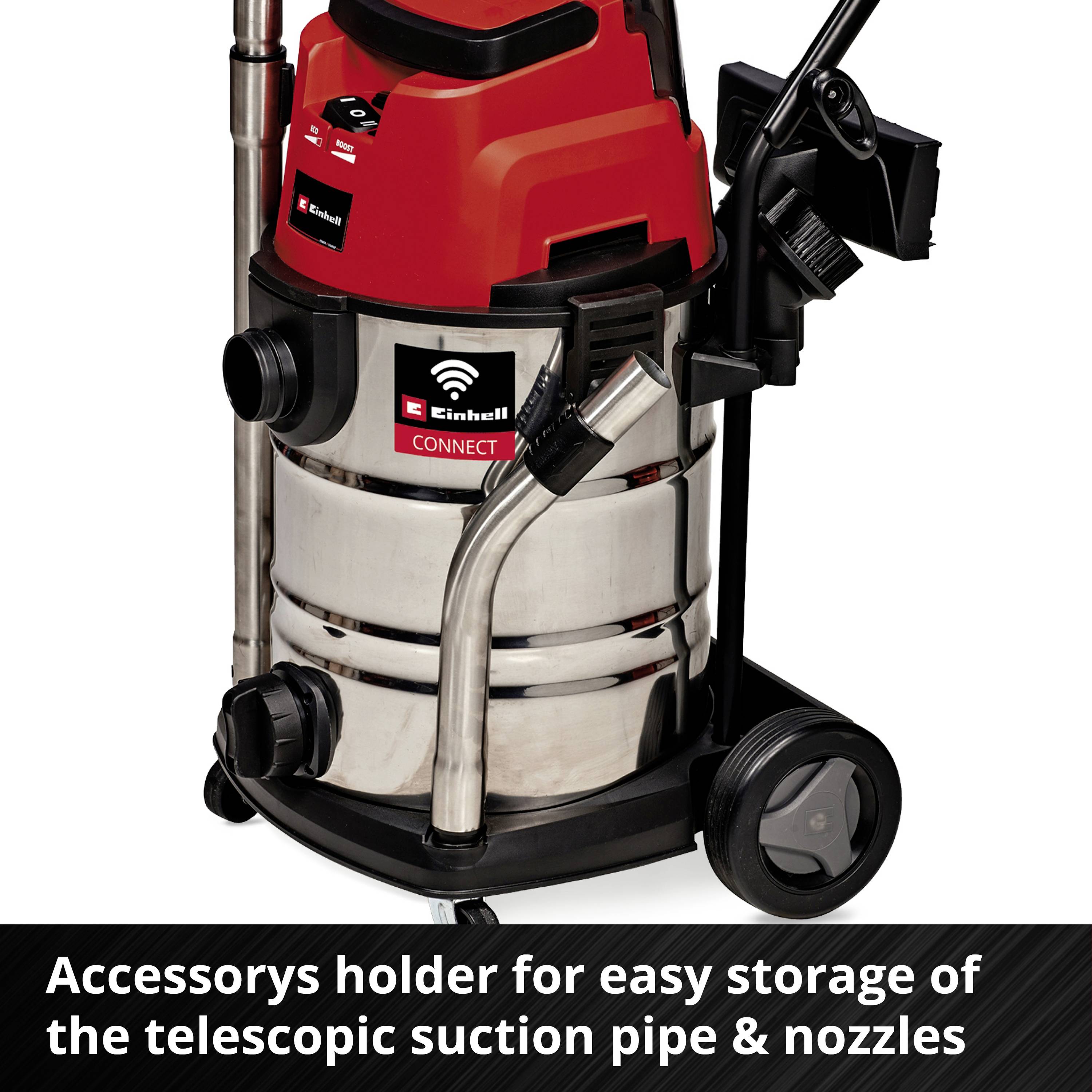Aspirateur industriel rouge et argenté avec support d'accessoires. Texte : Support d'accessoires pour un rangement facile du tube télescopique et des buses.