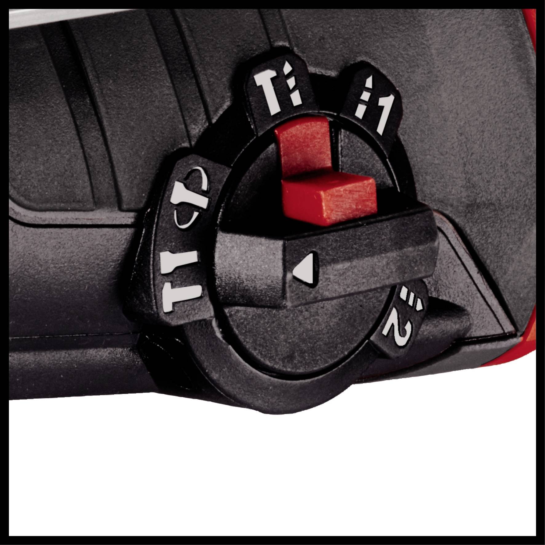 Un bouton de réglage noir avec des marquages rouges et blancs indique différents modes de perçage et de vissage sur une perceuse électrique portative.