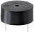 Buzzer piézoélectrique noir cylindrique avec deux broches métalliques à sa base, typiquement utilisé dans les dispositifs électroniques pour la signalisation sonore.