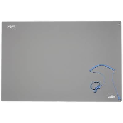 Un tapis de travail gris de Weller avec un bracelet antistatique bleu visible en haut à droite.